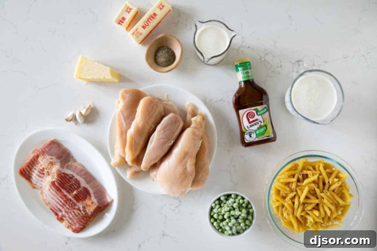 A spread of fresh ingredients, including chicken breasts, marinade, pasta, bacon, butter, garlic, creams, pepper, Parmesan, and peas, ready for Chicken Bacon Pasta preparation. Ingredients needed to make Chicken Bacon Pasta.