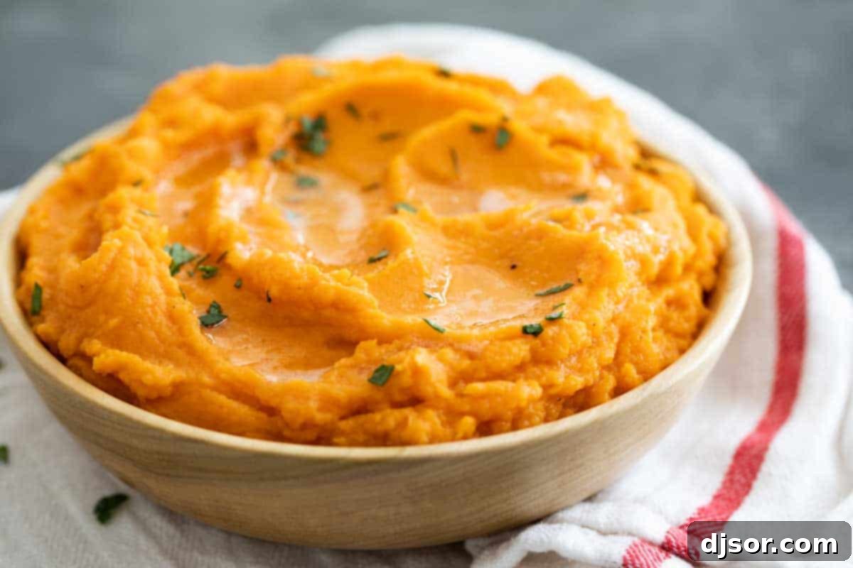 Creamy and buttery Mashed Sweet Potatoes with Brown Butter – perfect for any meal, from simple weeknights to grand holiday feasts. A bowl filled with rich, creamy mashed sweet potatoes, generously topped with glistening brown butter, ready to be served as a delightful side dish.