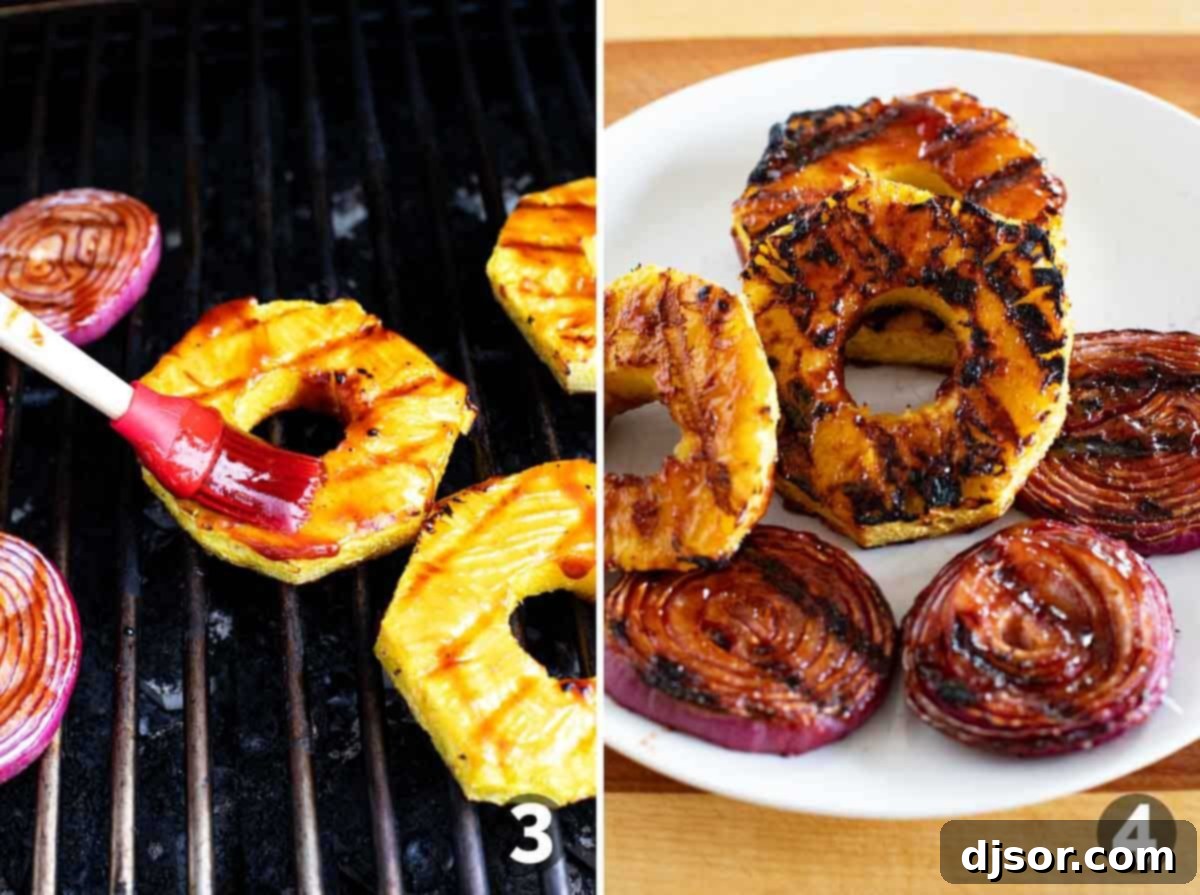 Pineapple Paradise Dogs 5 Grilled pineapple and red onions being brushed with barbecue sauce on the grill.