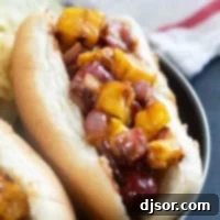 Pineapple Paradise Dogs 9 Hawaiian Hot Dogs with grilled pineapple and red onion with barbecue sauce.