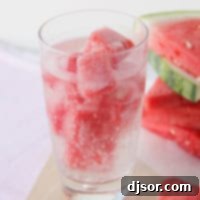 Watermelon Chill 6 Glass filled with watermelon ice and sparkling water.
