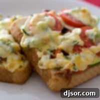 Bacon Tomato Cheese Melts 2 slices of bread topped with tomato, zucchini, bacon and melted cheese