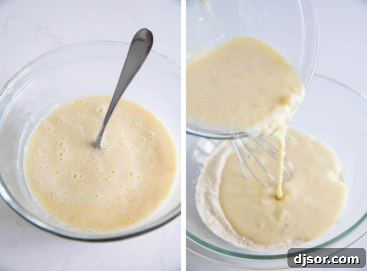 Mixing Wet and Dry Waffle Ingredients One bowl contains mixed wet ingredients for waffles, including mashed bananas, milk, eggs, and melted butter, while another hand pours this mixture into a larger bowl of dry ingredients.