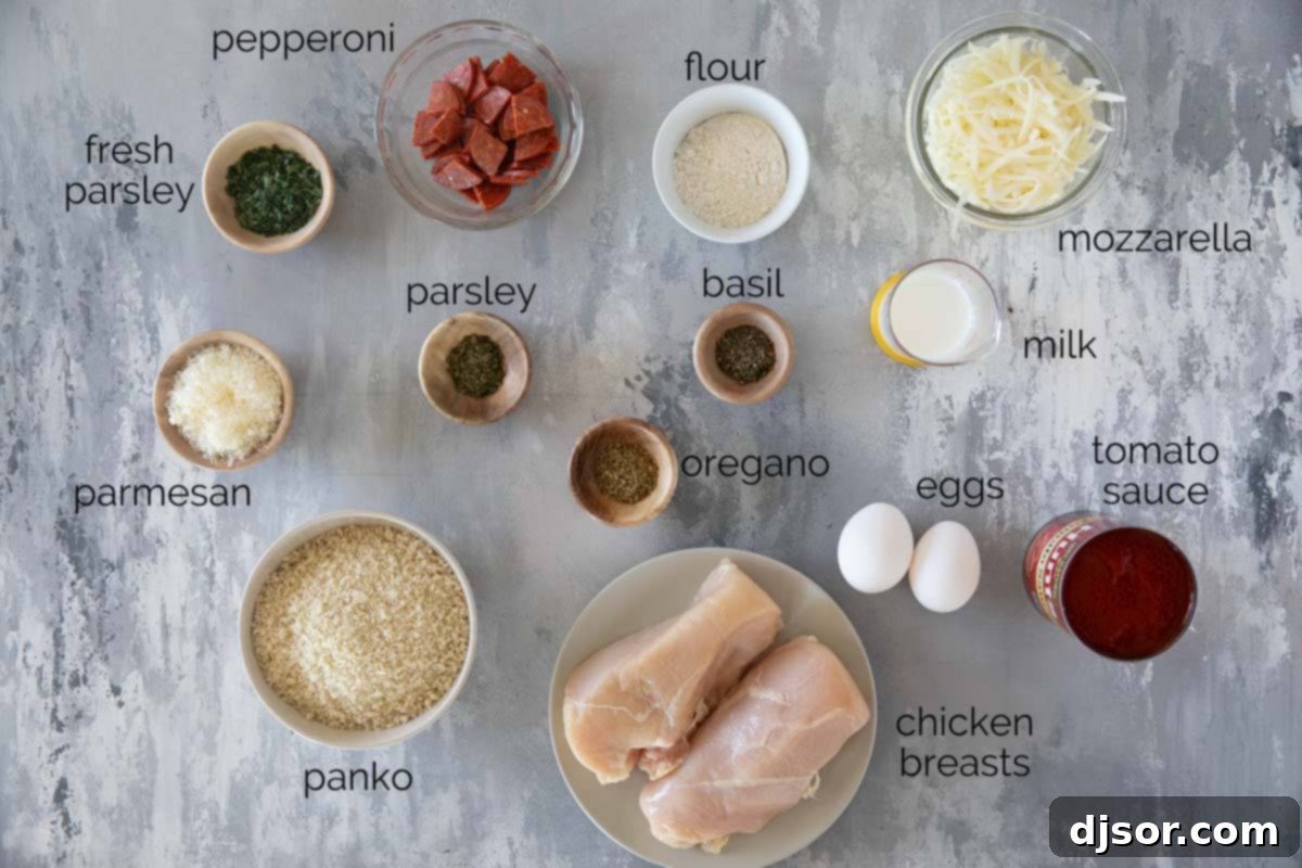 All the fresh ingredients laid out for preparing Chicken Pepperoni, including chicken breasts, cheese, pepperoni, and spices.