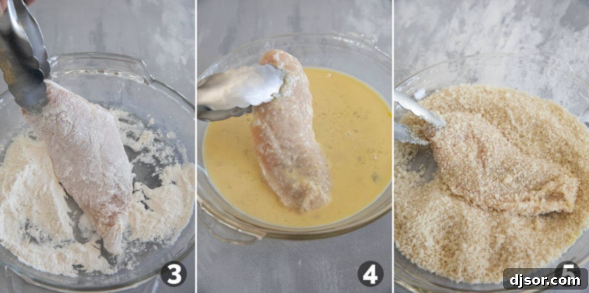Three shallow bowls arranged with flour, egg-milk mixture, and panko breadcrumbs, ready for coating chicken pieces.