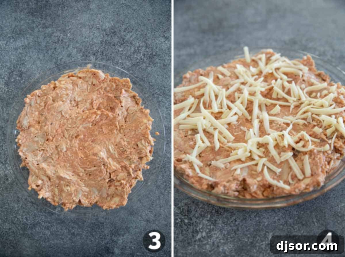 Spreading bbq chicken dip in a pie plate and then topping with shredded cheese.