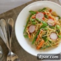 Soba Salad with Soy-Wasabi Vinaigrette - A refreshing and spicy Japanese noodle salad.