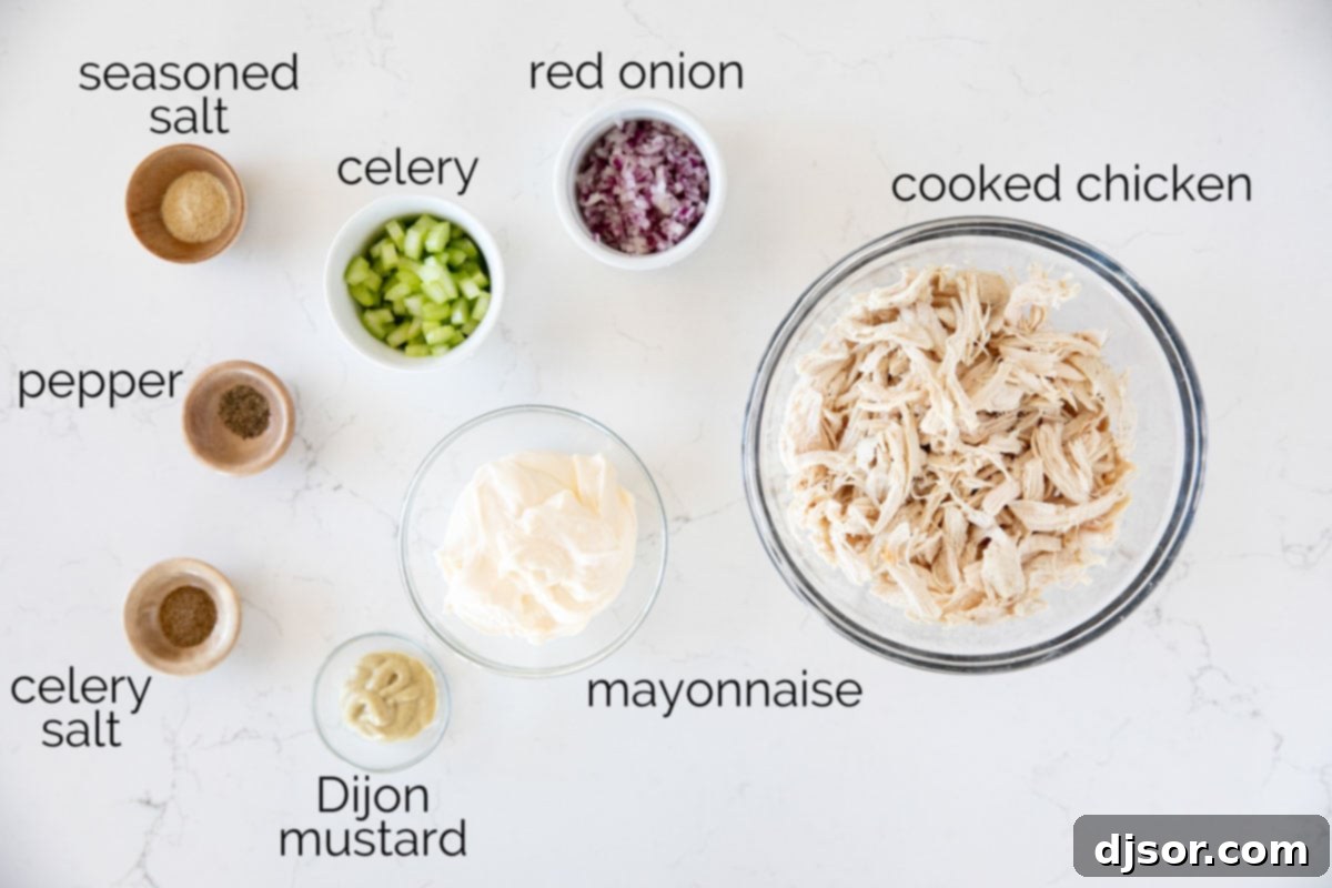 All the fresh ingredients needed to make a delicious classic chicken salad.