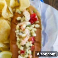 Shrimp rolls made with corn and peppers served with potato chips.