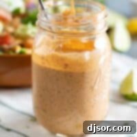 Smoky Chipotle Ranch 2 Mason jar filled with creamy Chipotle Ranch Dressing, ready to be served or stored.