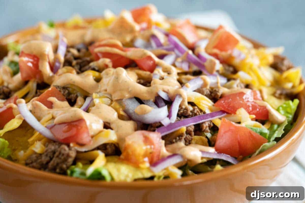 All of your favorite taco flavors, in salad form! This Taco Salad is a taco lovers favorite, and it an easy weeknight meal. It’s also great to set out buffet style so everyone can top their salad with their own favorites! chipotle ranch dressing on a taco salad