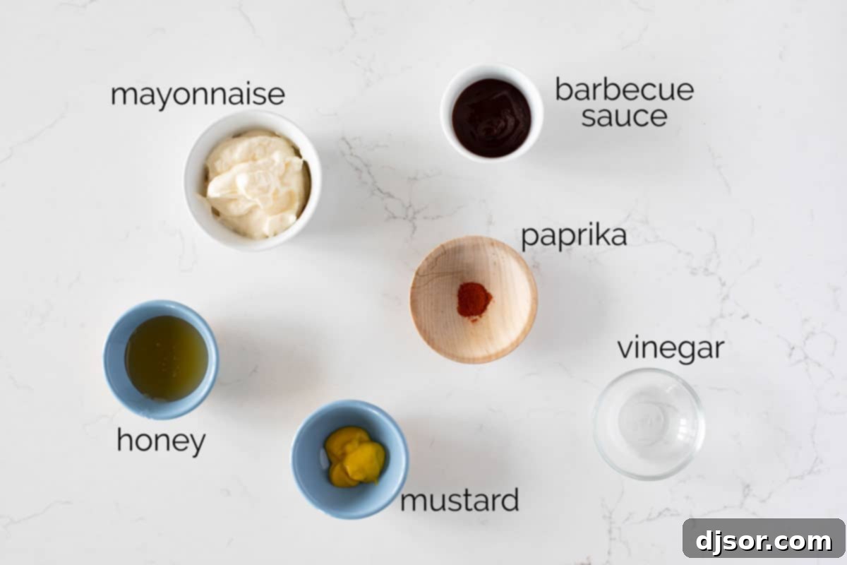 Simple ingredients needed to create your own copycat Chick-fil-A sauce. Ingredients for making homemade Chick-fil-A sauce laid out on a table