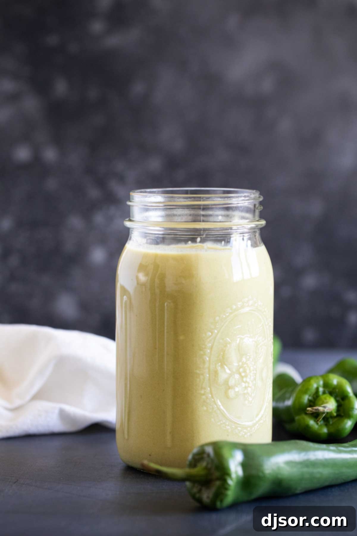 Verde Enchilada Sauce 8 A mason jar brimming with freshly made homemade green enchilada sauce, ready for storage or use.