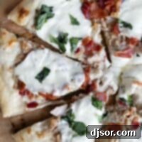 Bacon Clam Pie 2 Clam pizza with bacon, mozzarella, and basil.