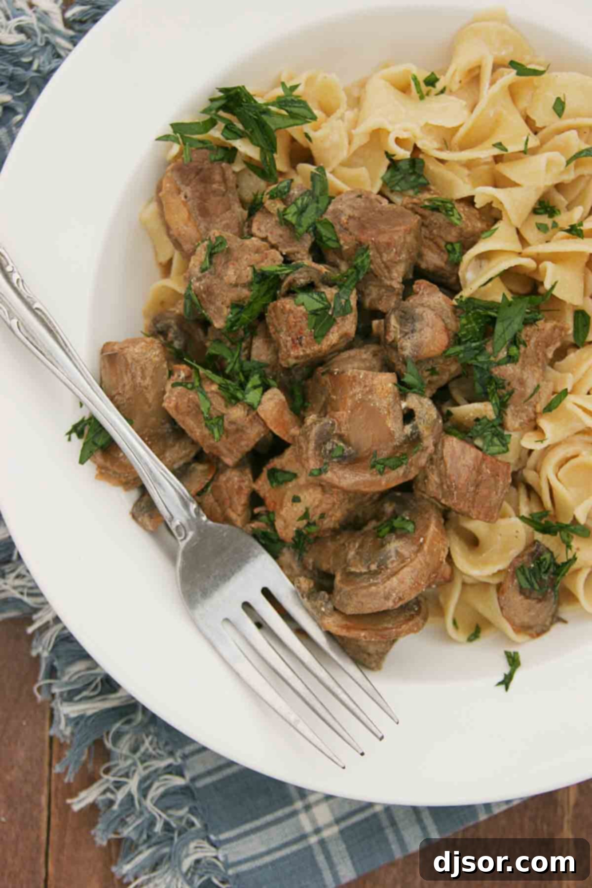 Slow Cooker Beef Stroganoff served with perfectly cooked egg noodles