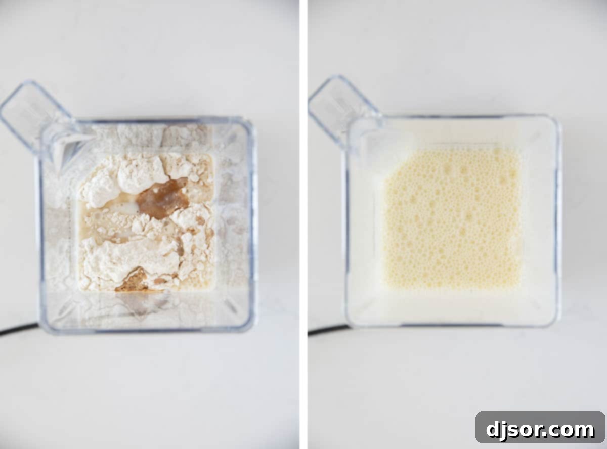 Close-up shot of a blender mixing the smooth batter for a Dutch Baby pancake, showing the uniform texture