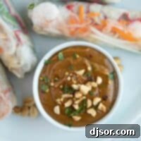 Peanut sauce topped with chopped peanuts and cilantro