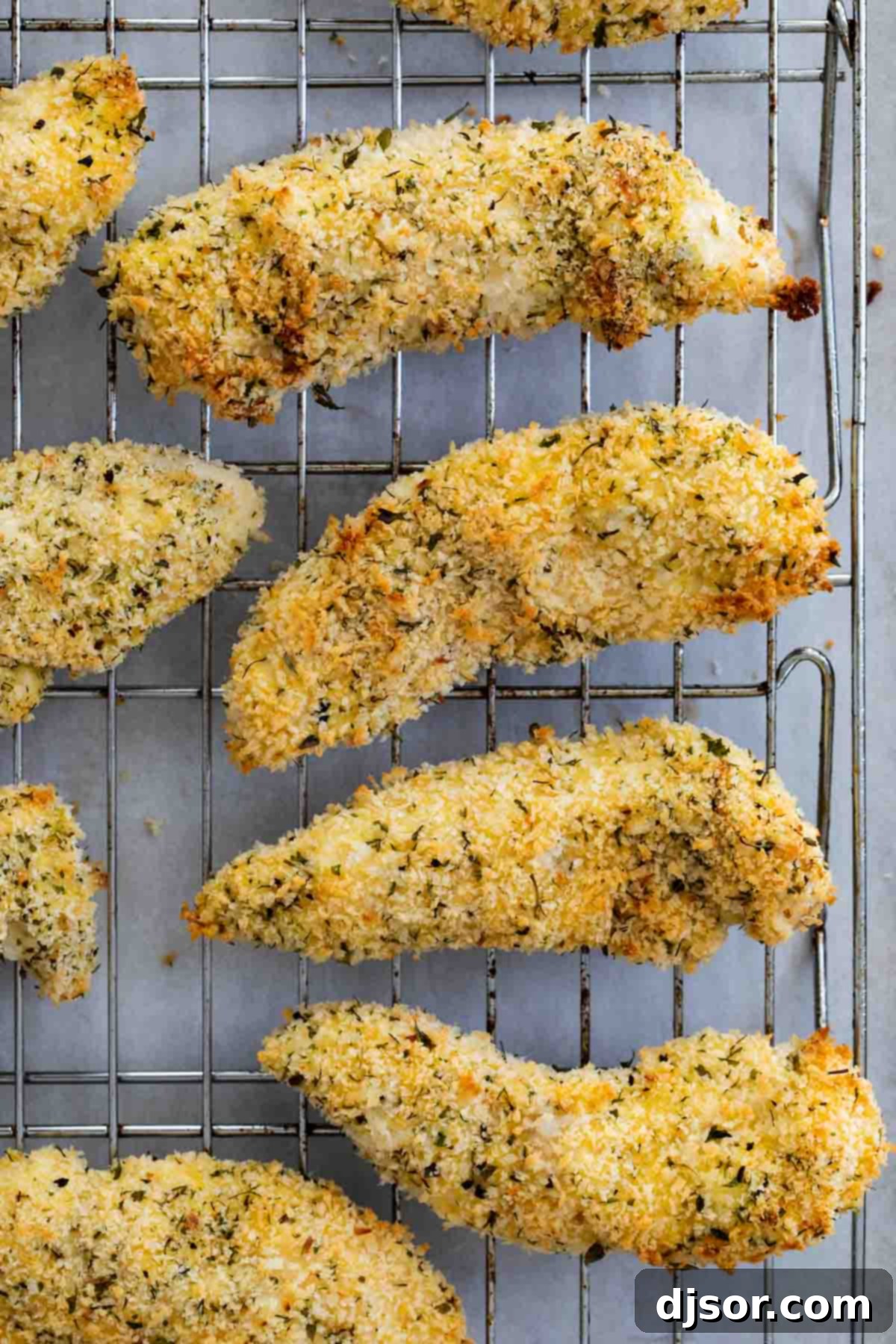 Crispy Baked Ranch Chicken Strips with Homemade Ranch BBQ Dipping Sauce for the Whole Family Delicious baked ranch chicken strips served with Ranch BBQ Dipping Sauce, a perfect family meal.