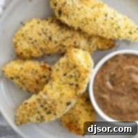 Crispy Ranch Chicken Strips with Zesty Ranch BBQ Dip 2 Crispy Ranch Chicken Strips on a plate with ranch bbq dipping sauce.