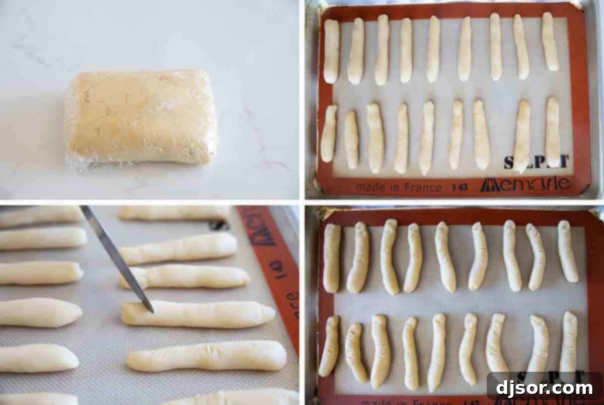 Shaping the Witch Finger Cookies Shaping shortbread dough into finger shapes.