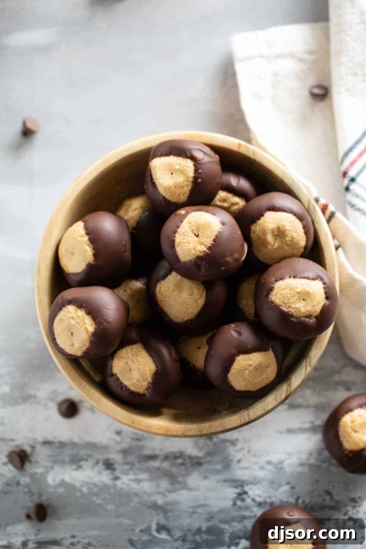 A Bowl Full of Homemade Buckeye Perfection Bowl of buckeyes - chocolate and peanut butter candies, ready to serve.