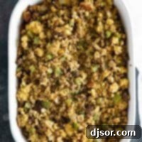 Savory Sausage Cornbread Dressing 2 Casserole dish filled with Cornbread Stuffing with Sausage.