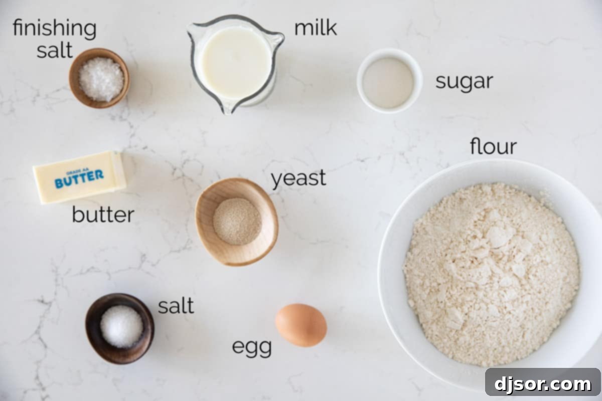A collection of fresh ingredients laid out, ready for making Parker House Rolls.