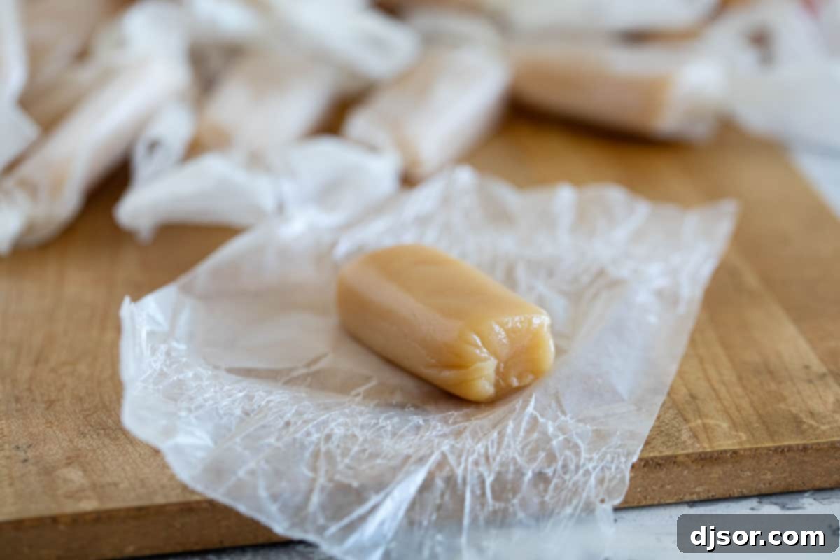 Perfect every time, these microwave caramels couldn’t get much easier! A few minutes of hands on time and you have caramel candy that tastes like you bought it at a fancy candy store. Caramel candy on a piece of wax paper.