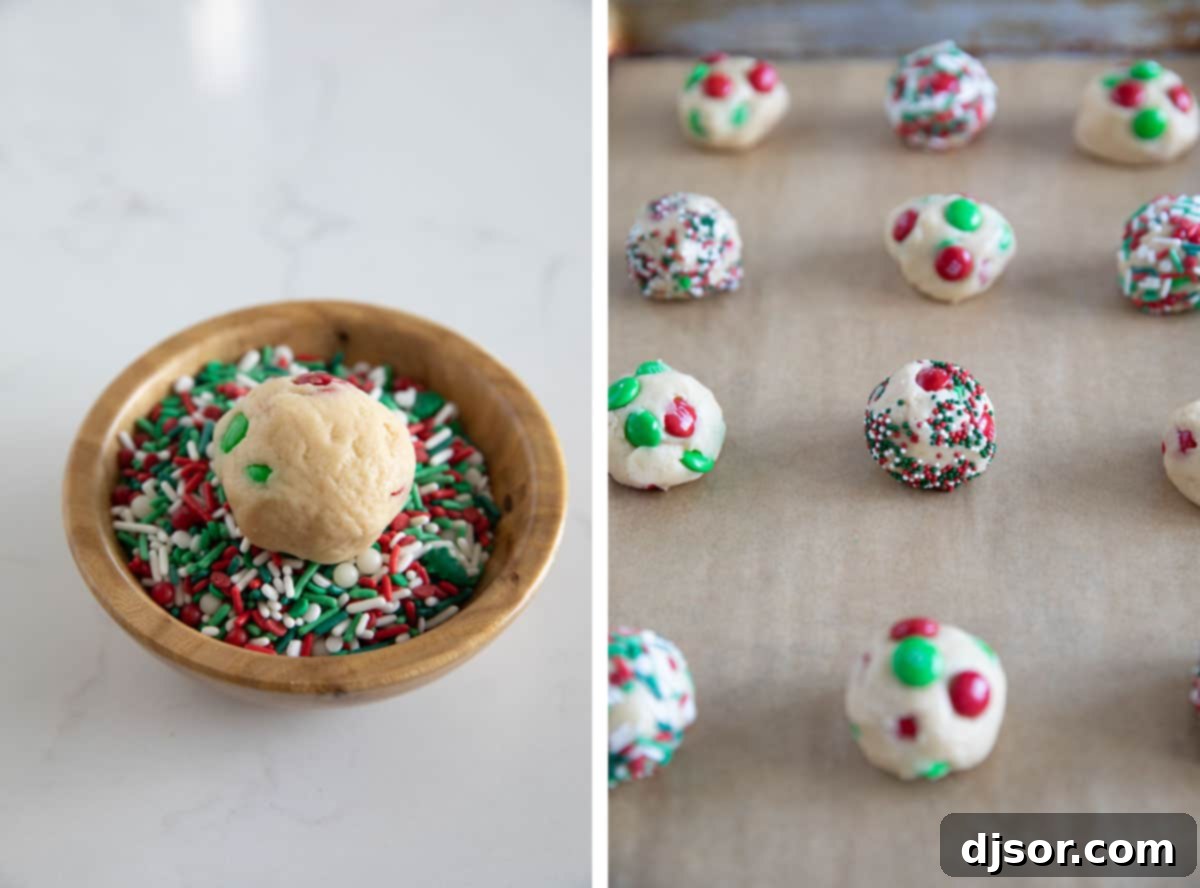 Soft, delicious, and super festive, these Christmas M&M Cookies will be a favorite for both kids and adults. Add sprinkles to make them even more fun! Hands rolling cookie dough into balls and coating them in festive sprinkles, then placing them on a baking sheet for Christmas cookies.