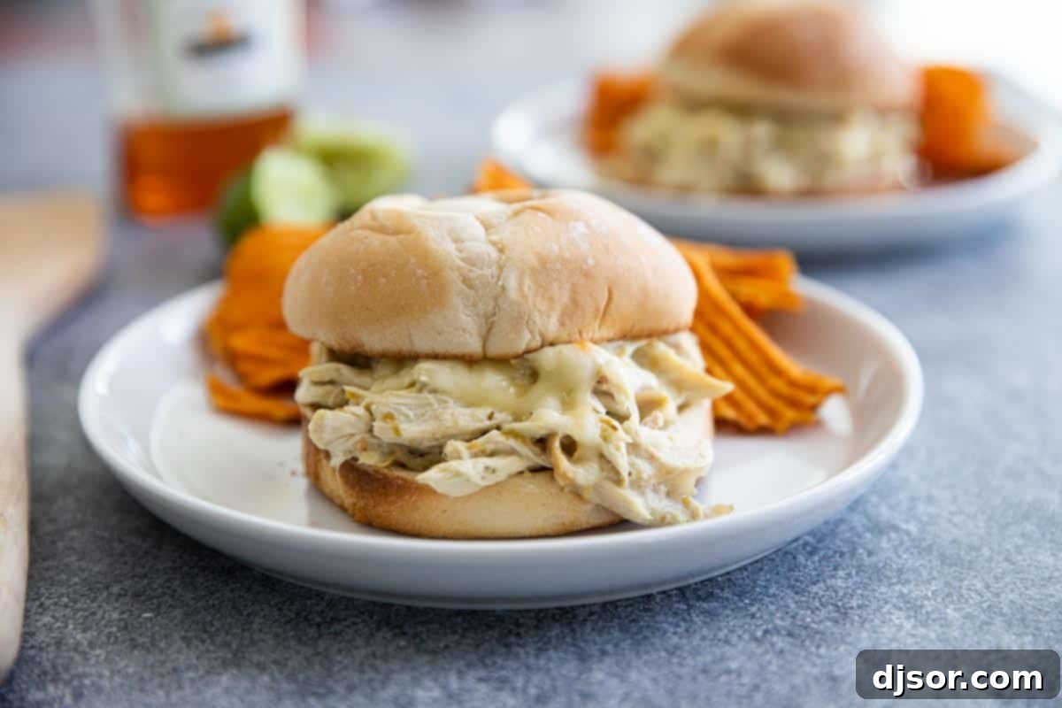 Easy Suizas Style Pulled Chicken Sandwiches – golden toasted buns filled with creamy, tangy shredded chicken and melted cheese