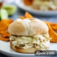 Pulled Chicken Sandwiches with a Suizas style sauce - a stack of two delicious sandwiches on a plate
