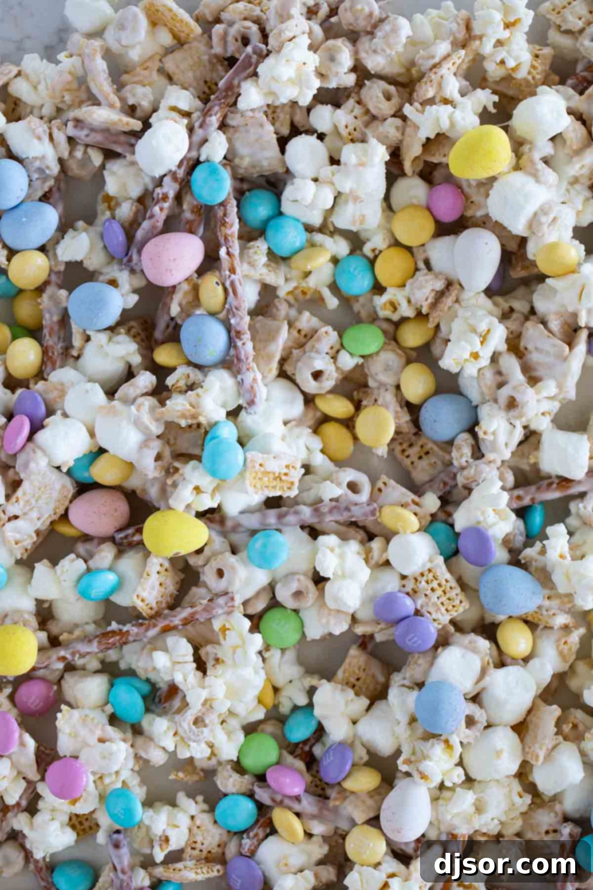 Bunny bait made with popcorn, cereal, pretzels, marshmallows, and candy.