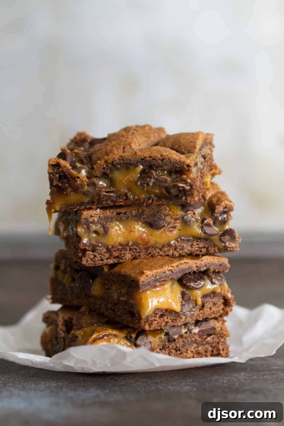 Stack of caramel brownies.