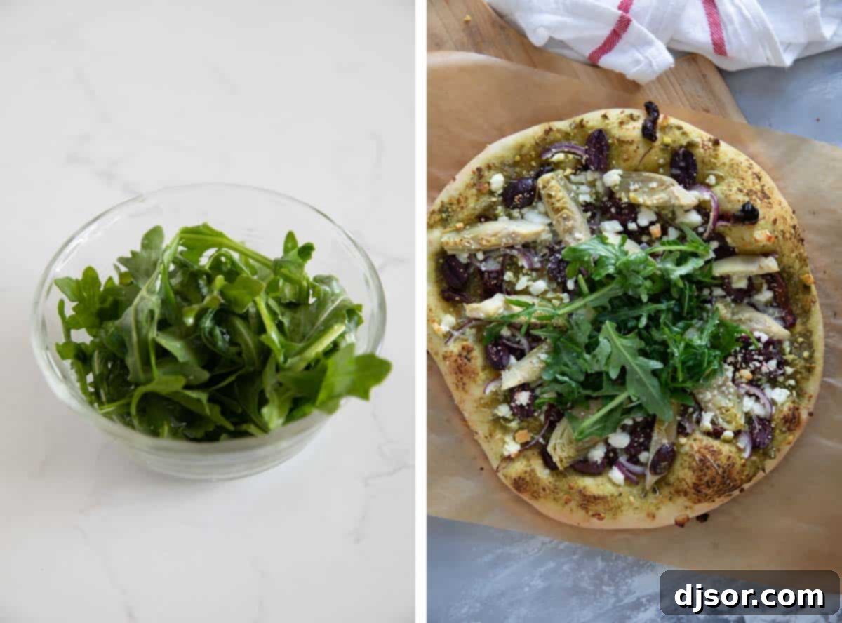 Adding Fresh Arugula to Mediterranean Pizza A close-up of fresh arugula being tossed with olive oil and salt in a bowl, alongside a fully baked Mediterranean Pizza topped with the seasoned arugula, ready to serve.