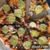 Full cheeseburger pizza drizzled with special burger sauce.