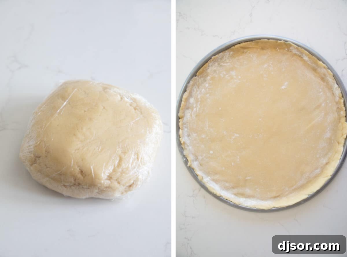 Indulge in the sweetness of summer with this irresistible Fruit Pizza. A sugar cookie base is topped with a sweet cream cheese frosting, then layered with fresh, in season fruit for a stunning dessert that is as delicious as it beautiful. Spreading cookie dough in a pizza pan for fruit pizza.