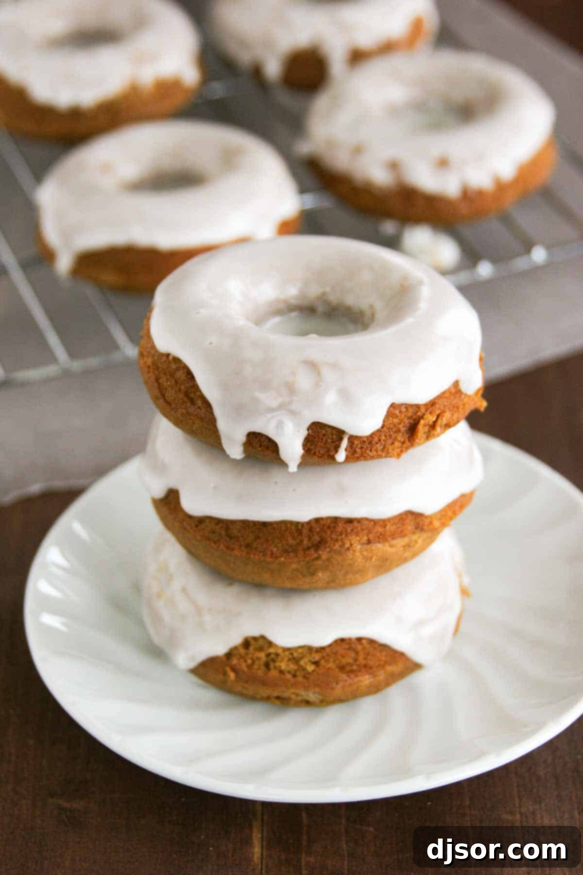 stack of 3 Glazed Gingerbread Baked Donuts