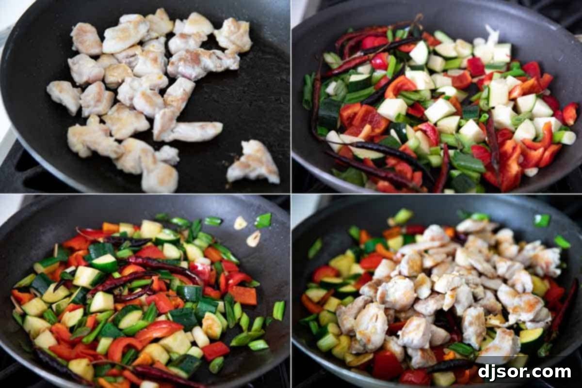 Stir-frying chicken and vegetables in a skillet for Kung Pao Chicken.