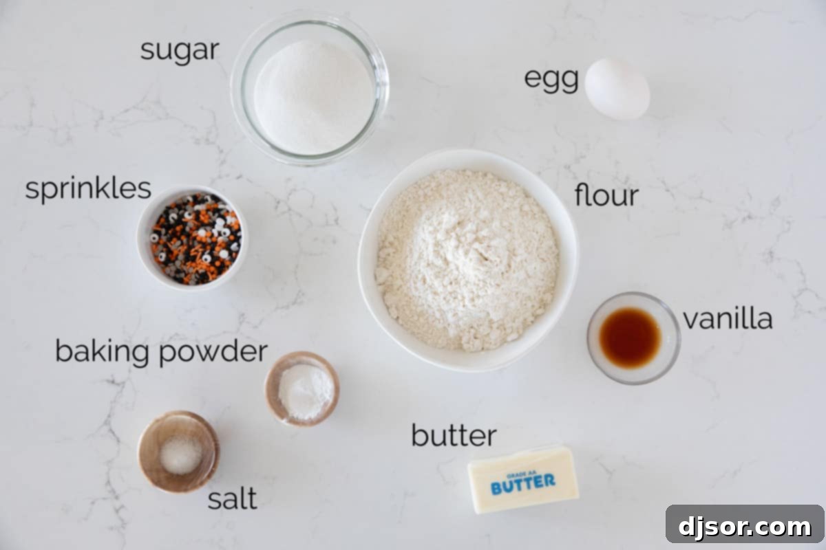 Monster Munchies 3 Close-up view of key ingredients arranged on a counter, ready for making Halloween cookies.