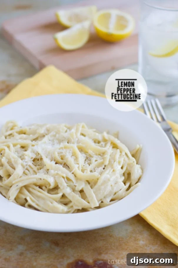 Bright and Zesty Lemon Pepper Fettuccine 2 Delicious Lemon Pepper Fettuccine on a plate, garnished with fresh herbs