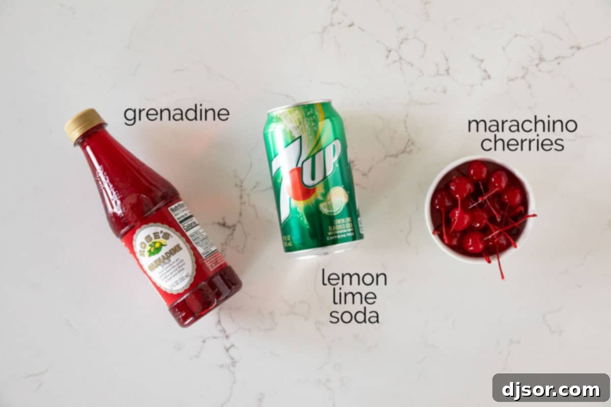 A selection of ingredients neatly arranged on a counter, ready to be used to prepare a refreshing Shirley Temple drink.