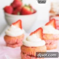 Strawberry Burst Cupcakes 2 Close-up of a frosted strawberry cupcake
