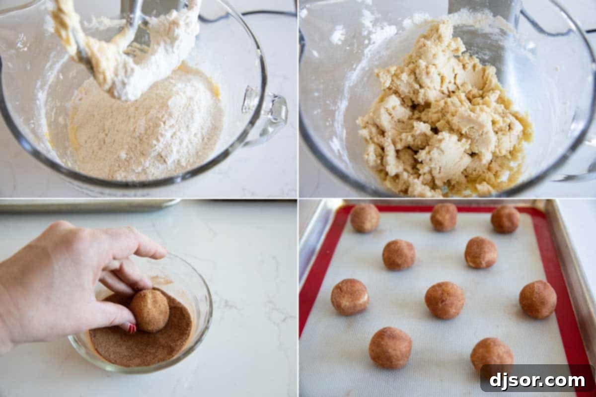 Perfectly soft, this is the best Snickerdoodle Recipe! This popular cinnamon sugar cookie recipe holds up for several days and requires no chilling time. You can have a batch on the table in no time! Hands rolling cookie dough into balls and coating them in cinnamon sugar, next to a bowl of the spiced sugar mixture.