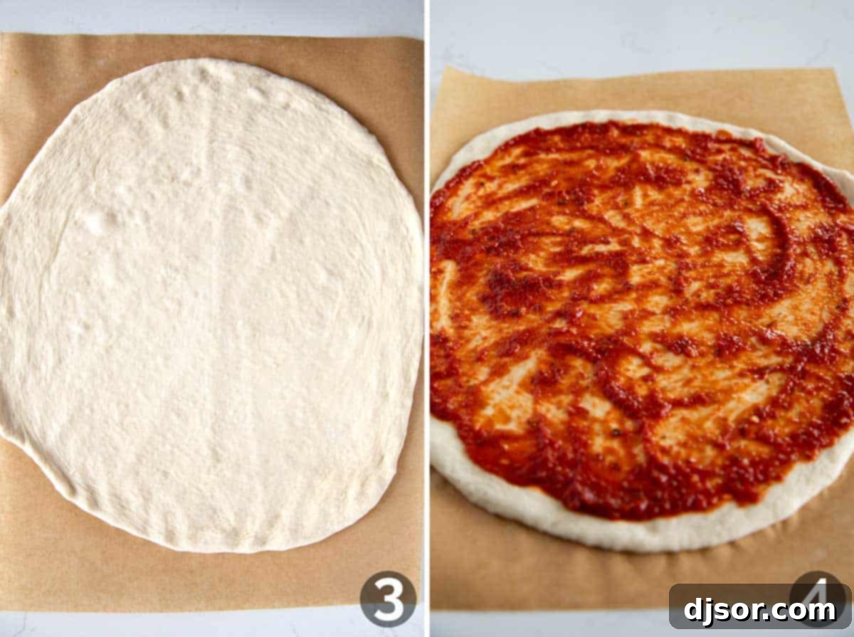 A pizza dough stretched into a perfect circle on parchment paper, followed by a generous layer of rich red pizza sauce spread evenly across its surface.