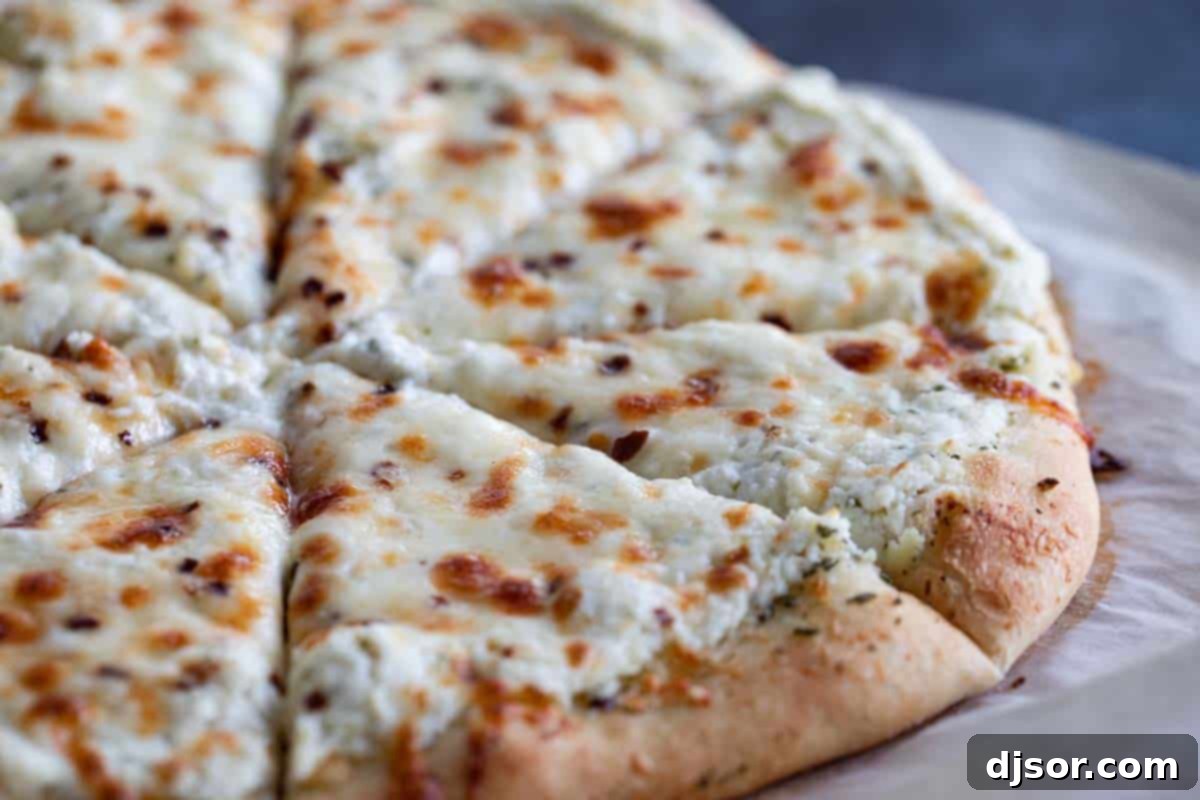 The Ultimate White Pizza: Three Cheese, Garlic & Rosemary Infused Delight White Pizza with Three Cheeses