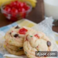 Fun Banana Split Cake Mix Cookies 4 Banana Split Cake Mix Cookies stacked on top of each other.