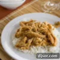 Golden Glazed Slow Cooker Teriyaki Chicken 3 Plate with slow cooker chicken teriyaki over white rice.