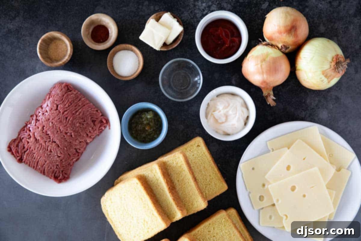 Classic Patty Melt 3 Ingredients laid out on a kitchen counter to make a Patty Melt, including ground beef, onions, bread, cheese, and sauce components.