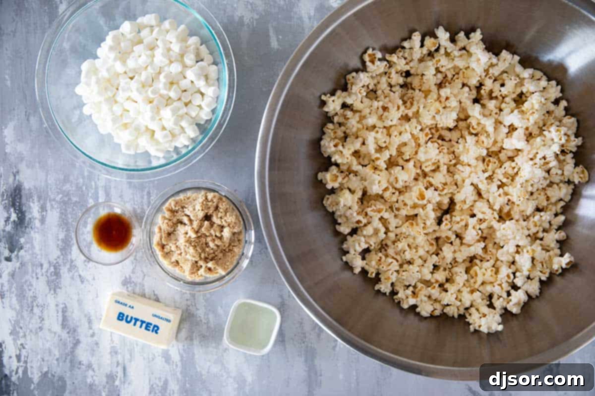 Gourmet Caramel Marshmallow Popcorn Clusters 3 Close-up of ingredients for Caramel Marshmallow Popcorn, including popcorn, brown sugar, butter, corn syrup, marshmallows, and vanilla extract.