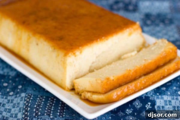 Exquisitely sliced Coconut Banana Caramel Custard revealing creamy texture and rich caramel